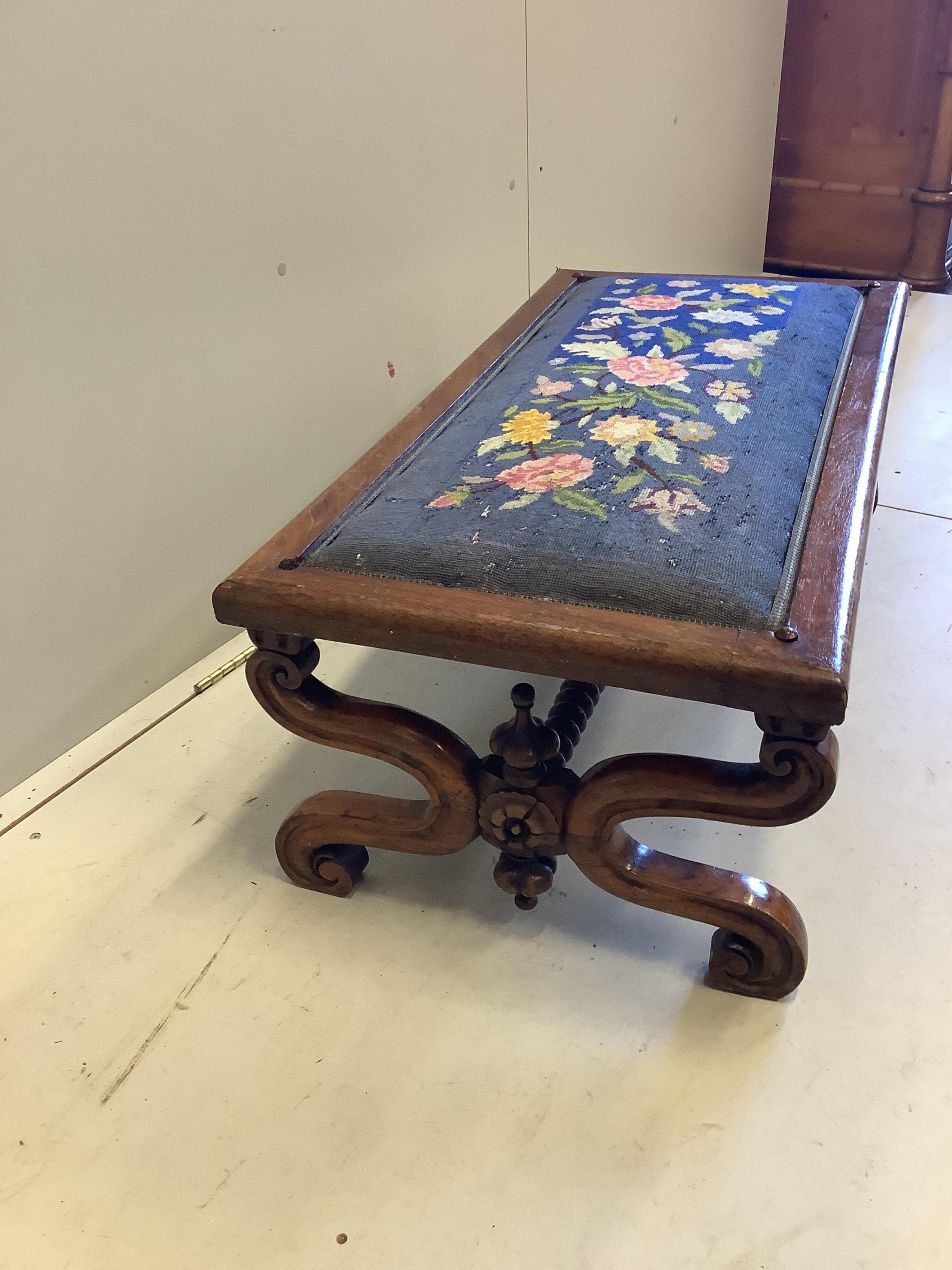 A Victorian mahogany X framed petit-point stool, width 52cm, depth 51cm, height 36cm. Condition - poor